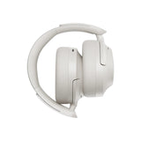 Casque anti bruit Bluetooth blanc pliable pour transport facile